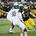 Michigan linebacker Jake Ryan attempts to tackle Michigan State quarterback Andrew Maxwell on Saturday. Michigan leads at halftime 6-0. Daniel Brenner I AnnArbor.com